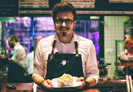 Smiling man with plate of food